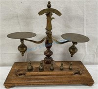 Brass scales with weights