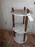 Three tiered 33in t marble stand  shelves 15in d