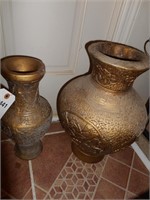 Embossed gold urns  not concrete or brass