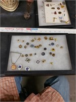 Collection of masonic and legion pins