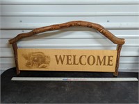 Wooden bear welcome sign