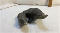 Vintage soapstone carved manatee and seal artist