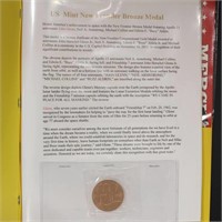 John Glenn Memorabilia, including bronze medals, p