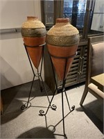 Pair urns on stand