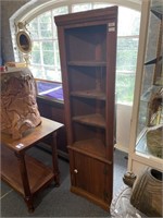 Petite wooden corner cabinet