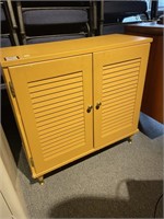 Yellow painted cabinet