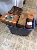 Tote full of wood cigar boxes