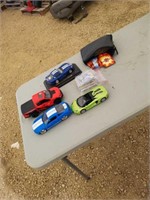 Bundle of model cars and sports cards
