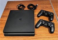 Sony PS4 slim w/ 2 controllers mo. CUH-2015A