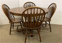 Modern round dining table and four chairs