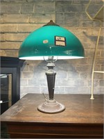 Green glass lampshade with metal base