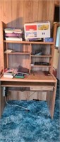 Modern fiberboard computer desk with contents,