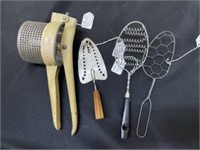 Vintage Kitchen Strainers, Spatulas And Yellow Met