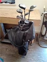 Black golf bag by quality Sports with clubs