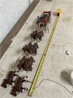 Cast iron surrey and horses