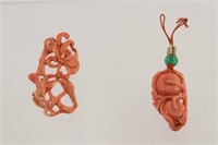 Two Chinese Carved Coral Pendants