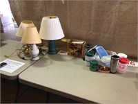 Three lamps and kitchen items
