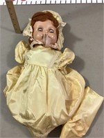 Antique doll without arms or legs