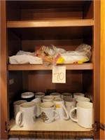 coffee mugs, plates, napkins