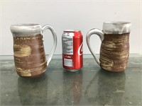 Ceramic mugs, signed