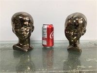 Bronzed ceramic boy & girl heads