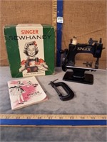 SINGER SEWHANDY MACHINE W/ TABLE CLAMP , BOOKLET &