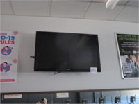 Soniq flat screen TV, approx. 42". (no remote)