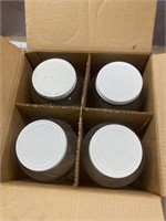 4 glass gallon jugs in box