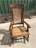 Rocking chair with wicker bottom and back