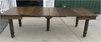 Oak Harvest table with six extra leafs