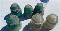 Green and Clear Glass Insulators