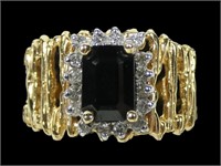 14K Yellow gold emerald cut blue sapphire with