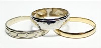 Lot, three 14K white and yellow gold bands, sizes