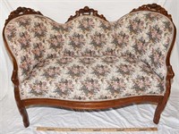 ROSE CARVED CREST SETTEE -HAS HAD REPAIRS AS SHOWN