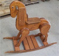 Wooden rocking horse.