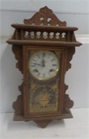 Pendulum wall clock.