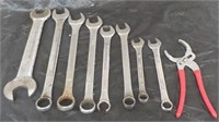 Varity of wrenches and specialty plyers.
