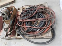 Assortment of hoses and a variety of items.