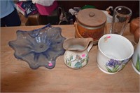 assorted pottery, wooden plates, and glass wear