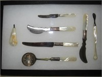 FRAME OF (7) PIECES OF DINNERWARE