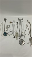 Variety of silver costume jewelry