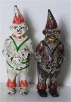 Lot #214 - (2) vintage cast iron figural clown