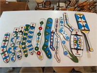 13 PAINTED SOCK STRETCHERS, 2 PAINTED TRAYS