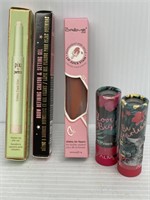 Makeup lot- 3 lipsticks, eyeshadow stick, & brow