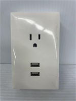 Wall plug in with place for 2 USB port plugs