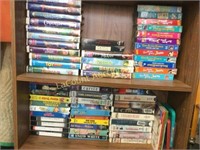 2 shelves huge amount VHS tapes disney