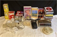 Clocks, Phone, Bulbs, CD’s, VHS