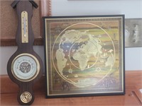 Vintage barometer and world map