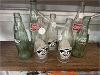 Empty coke bottles