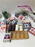 A lot of vintage playing cards with chips